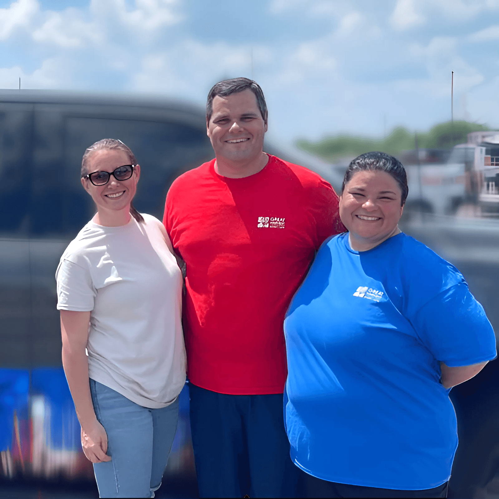 Three Great Harvest franchise owners in Great Harvest apparel